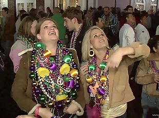 Crazy party girls flashing their tits during Mardi Gras